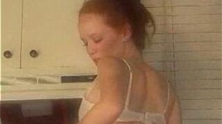 Heather Carolin stripping in the kitchen - porn video